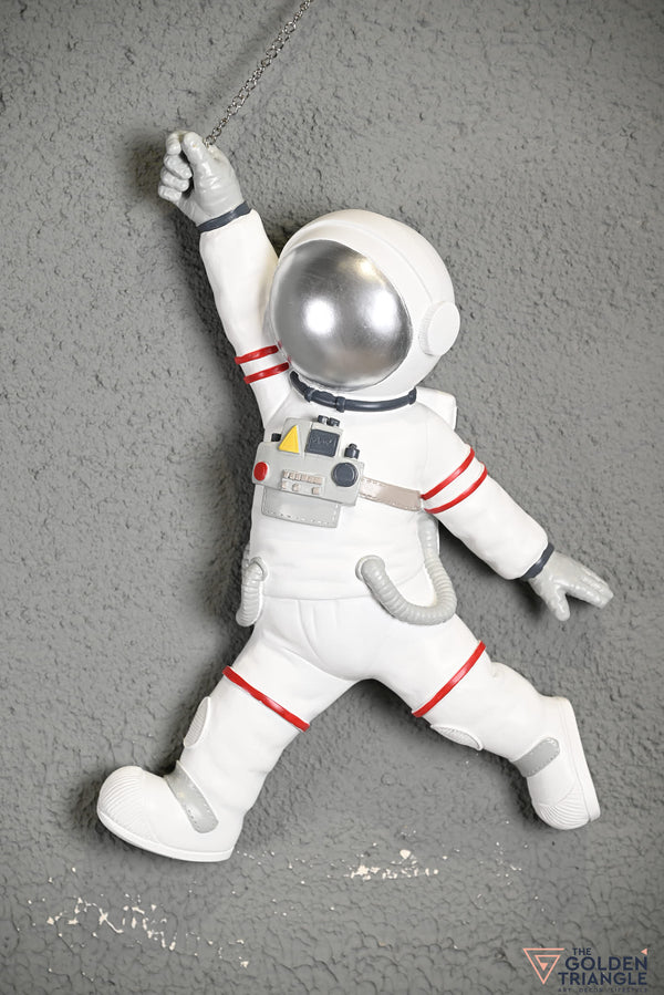 Astraeus - Wall Astronaut holding Saturn Balloon - Peach
