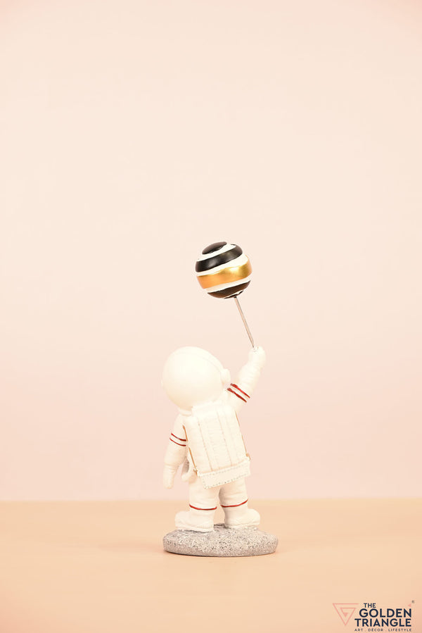 Titan - Astronaut holding a Ballon - Black & Gold