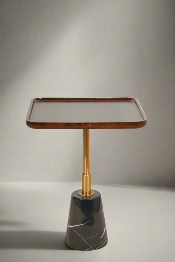 a marble side table with wooden top
