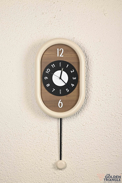 Wooden Wall Clock with pendulum in beige colour for living room