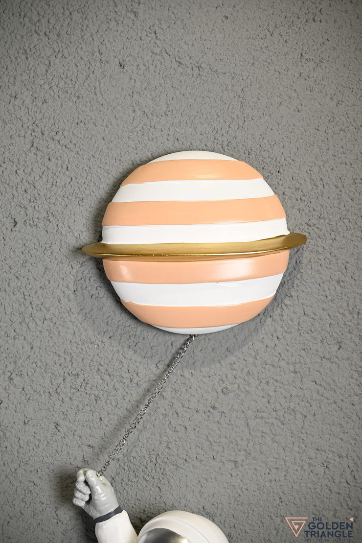 Astraeus - Wall Astronaut holding Saturn Balloon - Peach