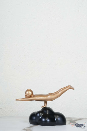 Flying Man Artefact - Black & Gold