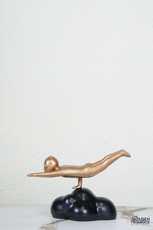 Flying Man Artefact - Black & Gold