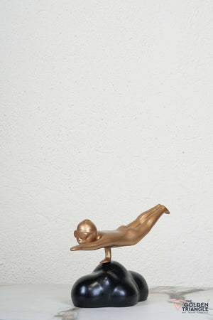 Flying Man Artefact - Black & Gold