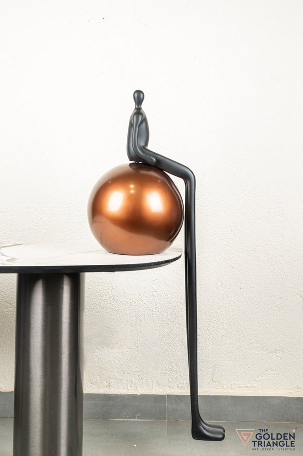 Xero Sculpture sitting on Sphere