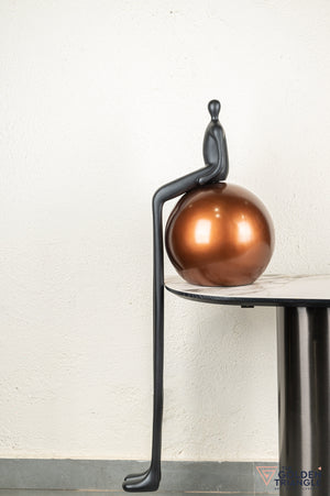 Xero Sculpture sitting on Sphere